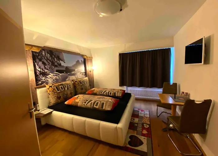 Arlos - - Restaurant - Bar Hotel Savognin