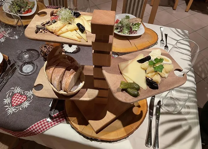 Arlos - - Restaurant - Bar Savognin