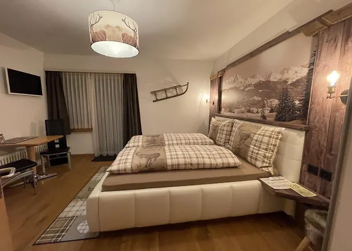 Hotel Arlos - - Restaurant - Bar Savognin