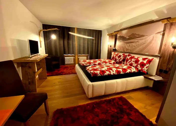 Hotel Arlos - - Restaurant - Bar Savognin